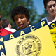 Voting Rights Act supporters outside the Supreme Court before the ruling (Nicholas Kamm/AFP/Getty Images)